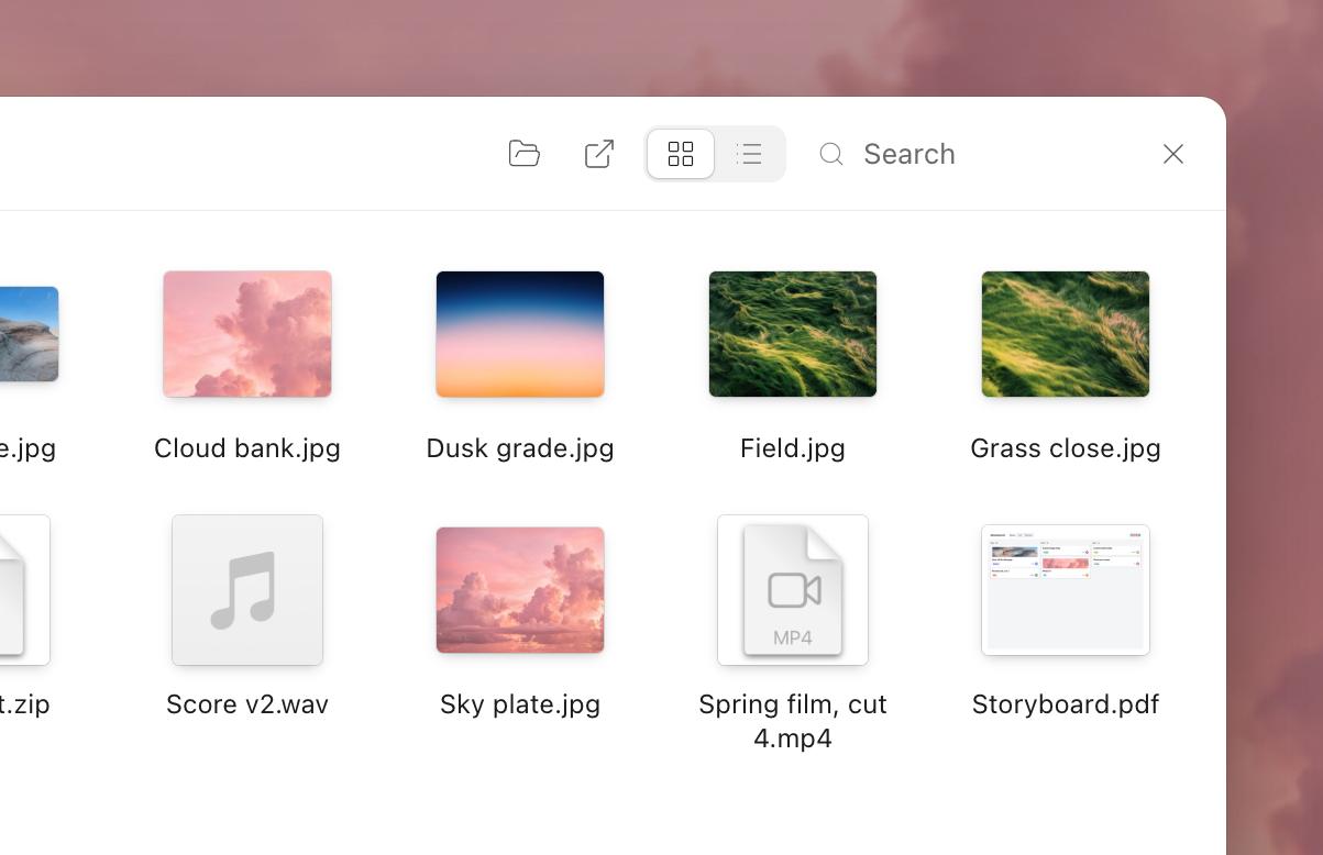 A folder from someone's computer, open in its window on the Clouds wallpaper: photos, a film, a PDF, a zip and a sound file, with their previews.